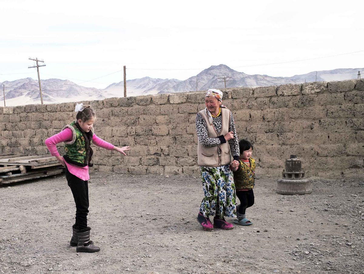 Anargul's father died suddenly in December 2015. Now her mother takes her for a short walk in winter.